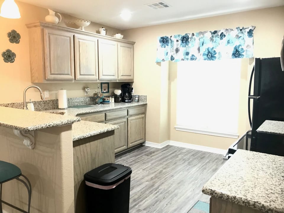 The spacious kitchen is ideal for cooking....if you choose!