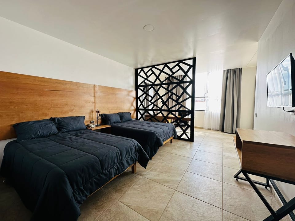 Superior Studio Suite | Down comforters, individually furnished, desk, blackout drapes