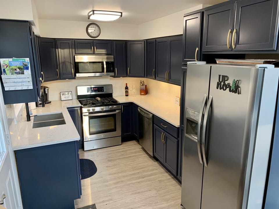 Completely updated kitchen with quartz countertops & newer appliances