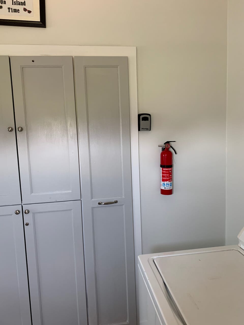 Laundry room. guest closet top, owner closet bottom. Slide out broom closet