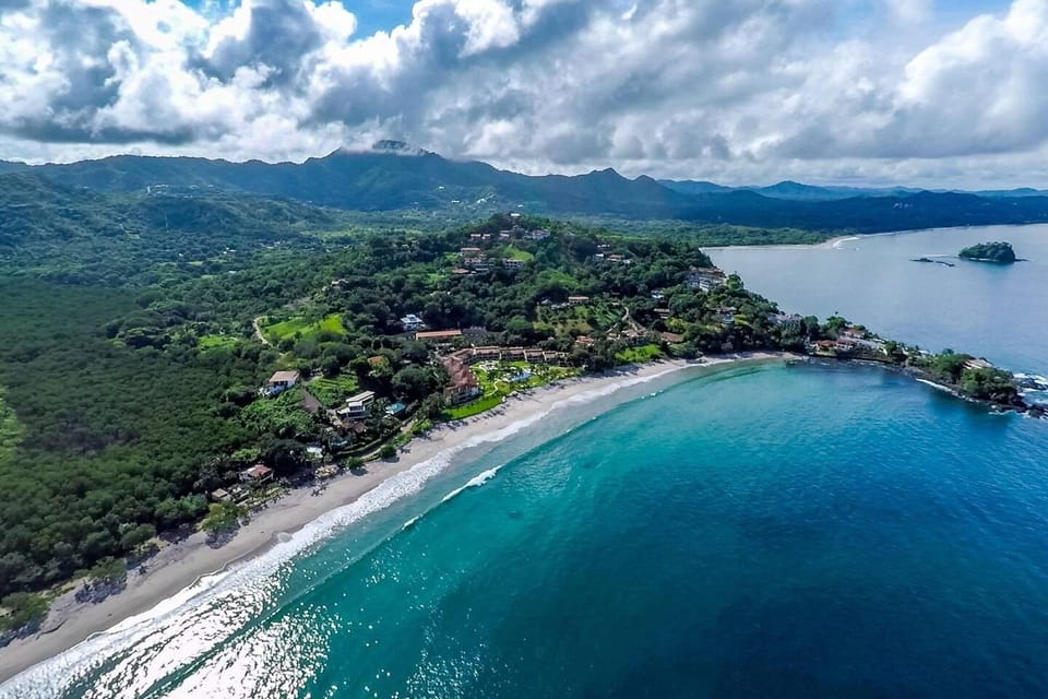 Modern Oceanfront Condo with a Chic Coastal Design, Resort-Style Amenities, and Direct Beach Access Apartment in Playa Flamingo