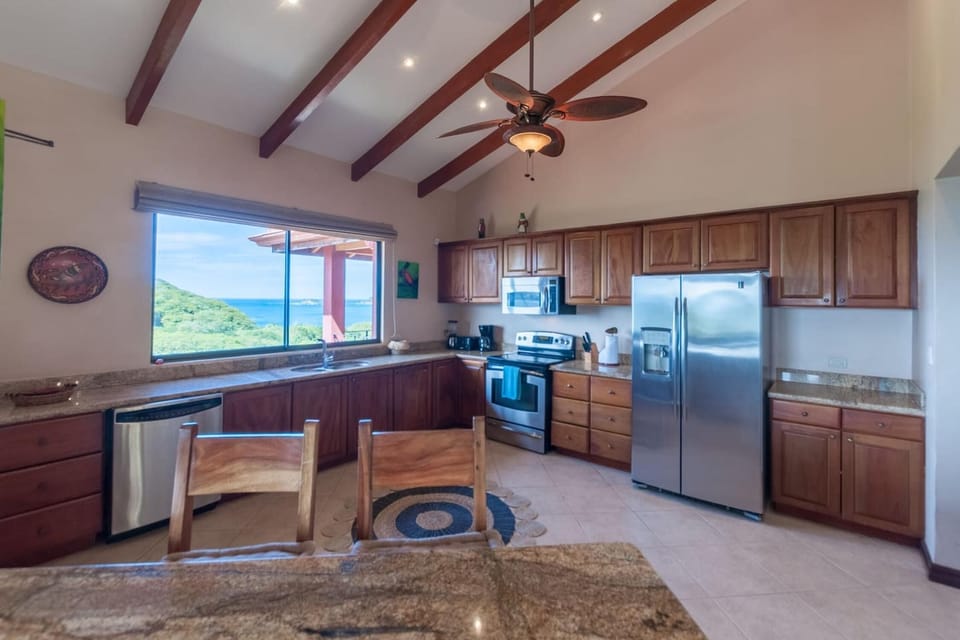 Apartment, 3 Bedrooms, Ocean View | Private kitchen | Full-size fridge, microwave, stovetop, dishwasher