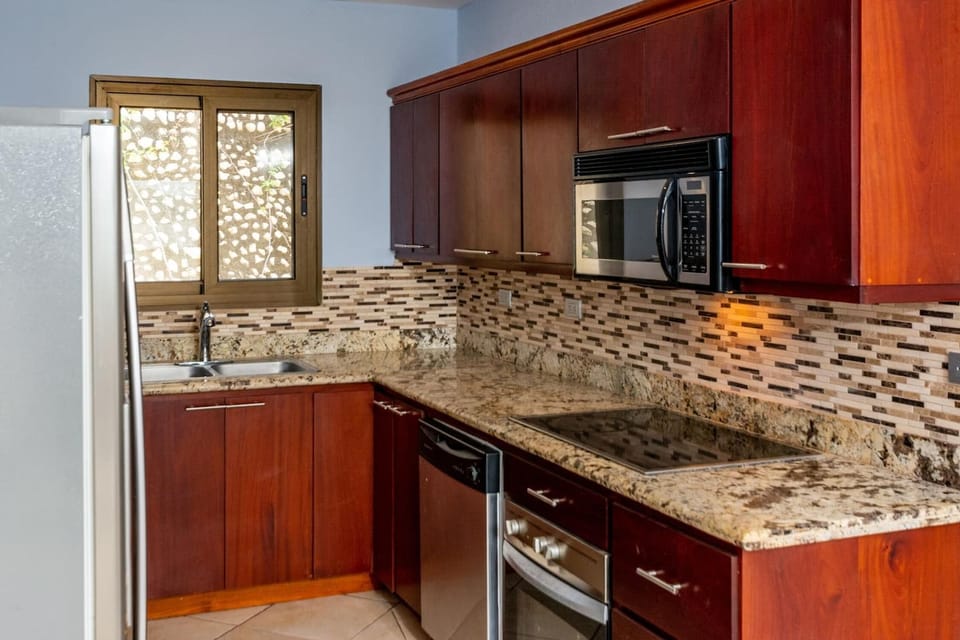 2-Bedroom Condo with Ocean View and Pool | Private kitchen | Full-size fridge, microwave, coffee/tea maker