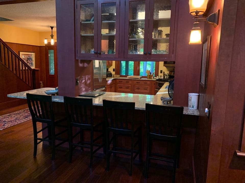 Dining adjoins Kitchen with breakfast bar seating.