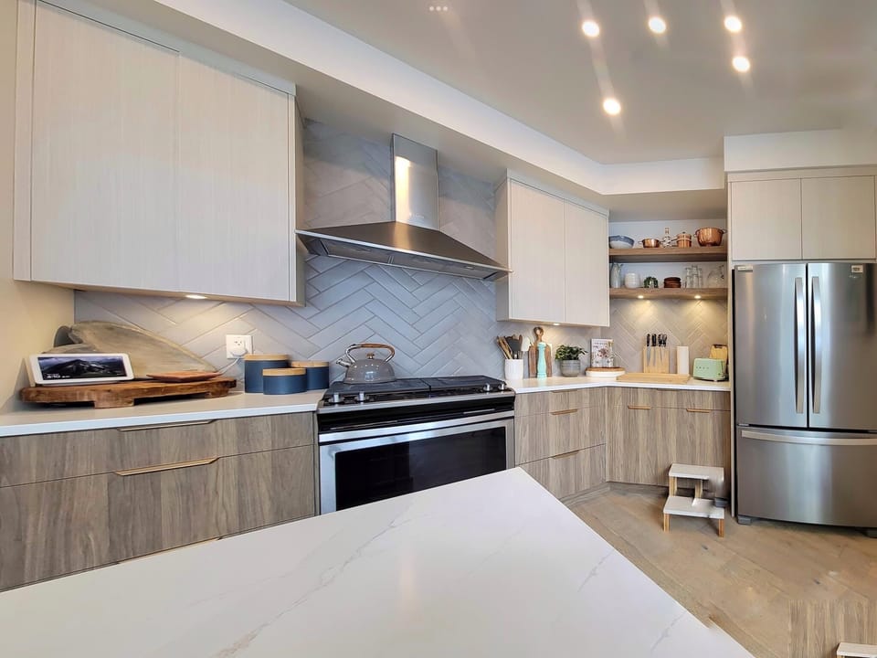 Modern fully stocked kitchen with gas stove 