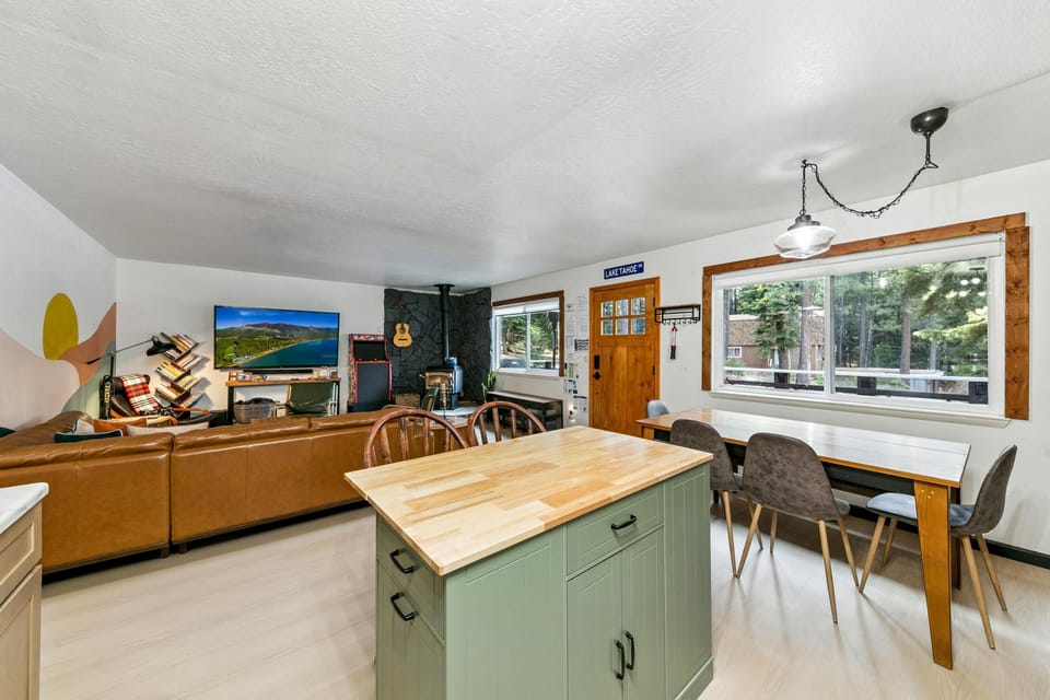 Bright, airy kitchen with cozy dining nook and scenic window view