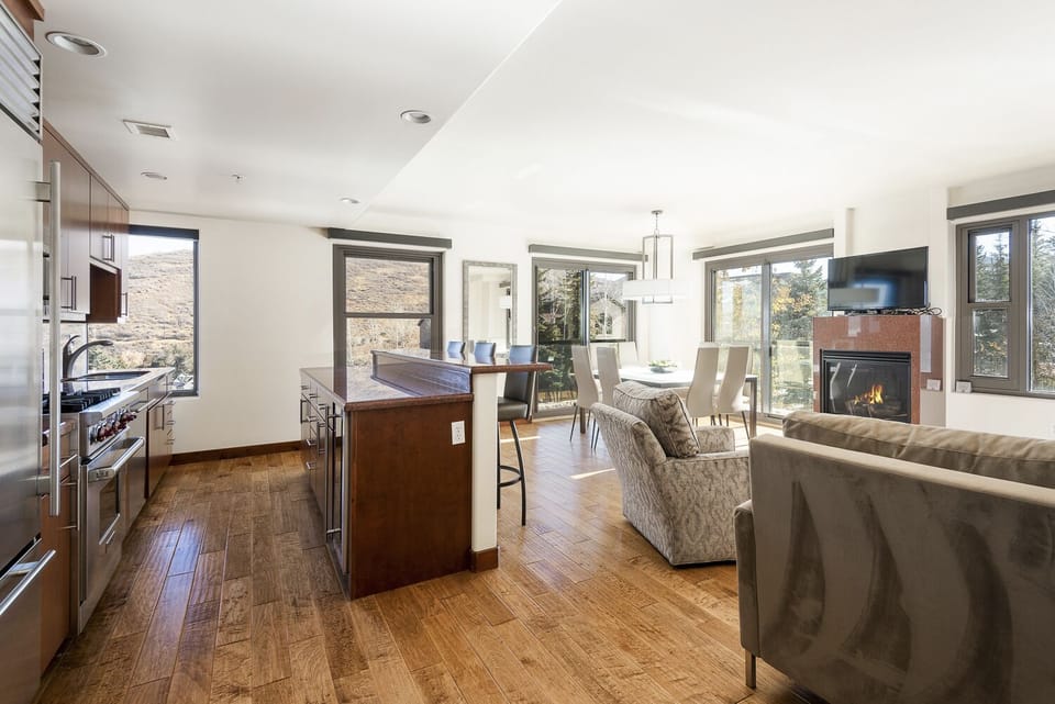 Lowell 202 kitchen, living, and dining with large window walls