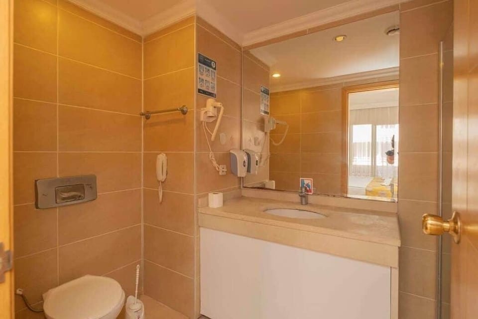 Shower, free toiletries, hair dryer, slippers