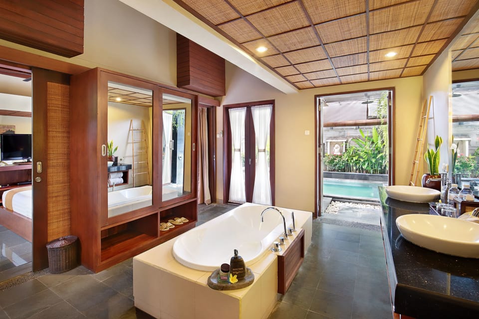 Separate tub and shower, rainfall showerhead, eco-friendly toiletries