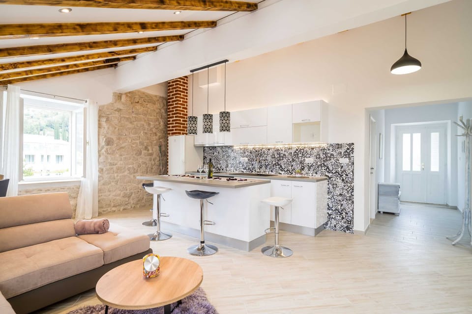 Villa (Three-Bedroom Villa) | Living room | 25-inch TV with digital channels
