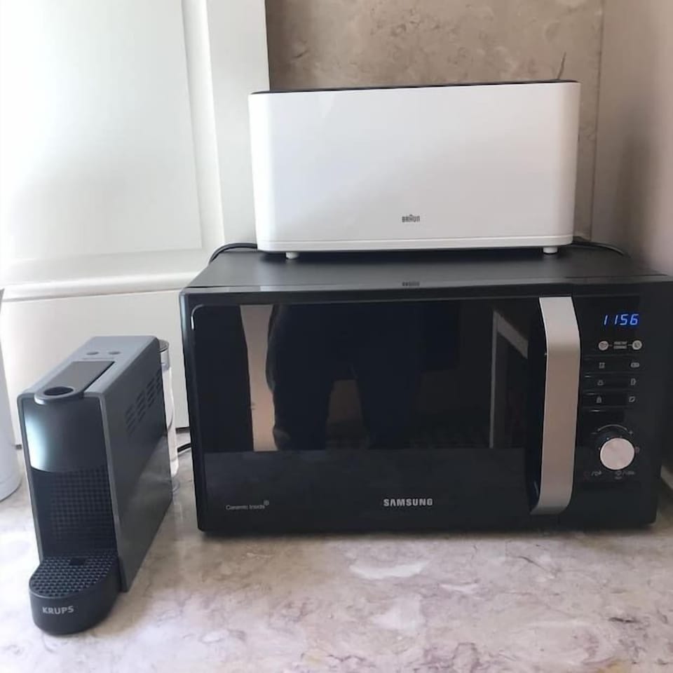 Our Kitchen is equipped with Espresso Machine, Toaster, Kettle and Microwave and Cooker and Oven