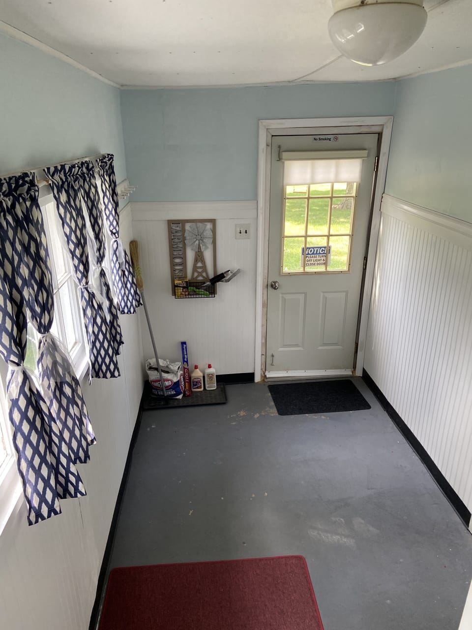 Mudd room leading to the backyard.