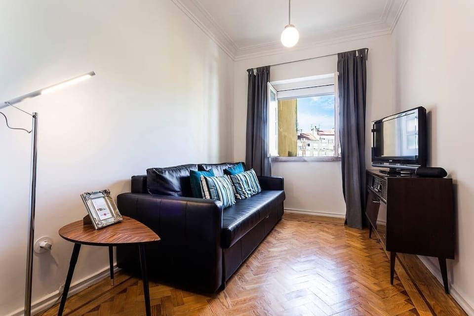 Living room with sofa bed and a vintage Radio!