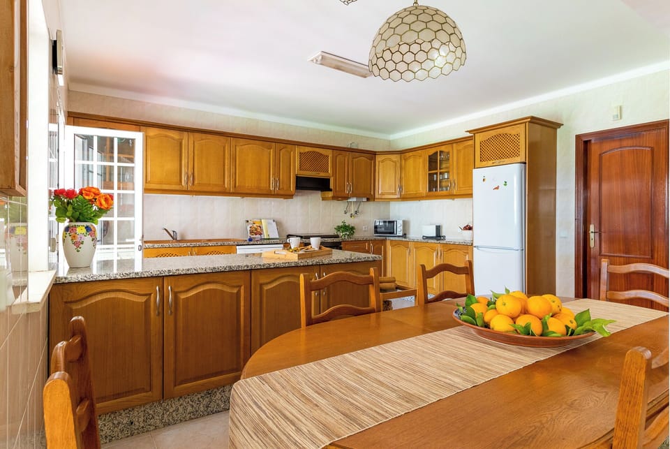The open space lounge/dining room/kitchen