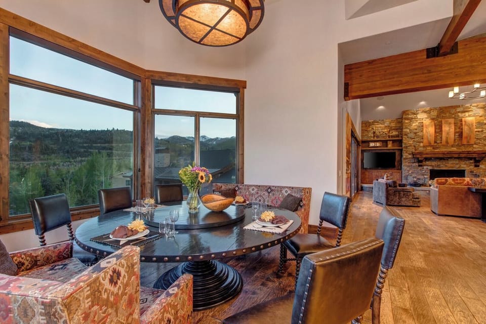 Share meals at the large dining table with seating for ten and stunning views.
