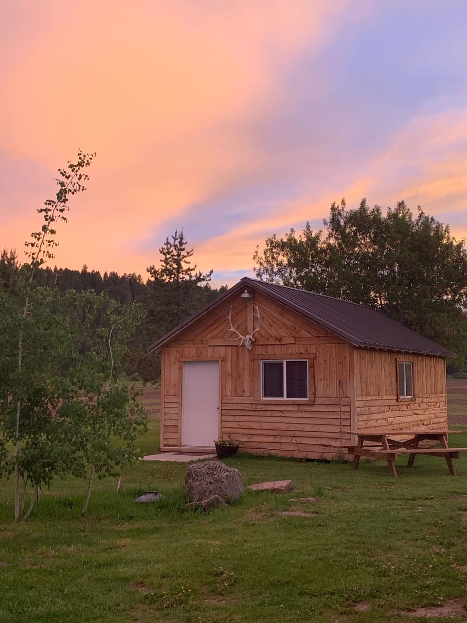 Front of cabin at sunset