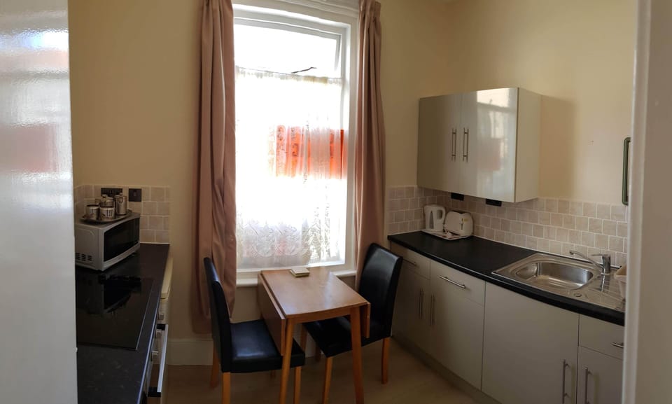 Apartment | Private kitchen | Fridge, microwave, oven, stovetop