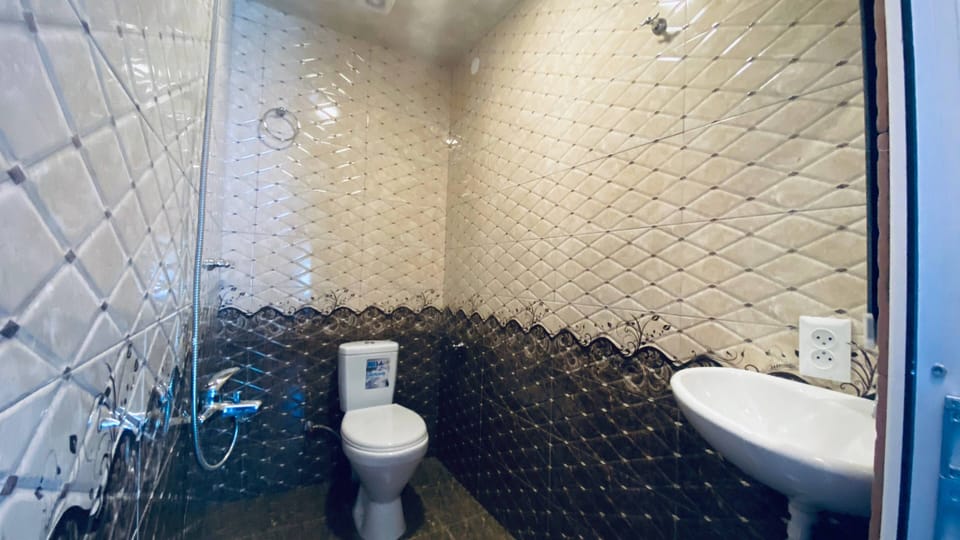 Classic Double or Twin Room, Private Bathroom | Bathroom | Shower, hair dryer, slippers, towels