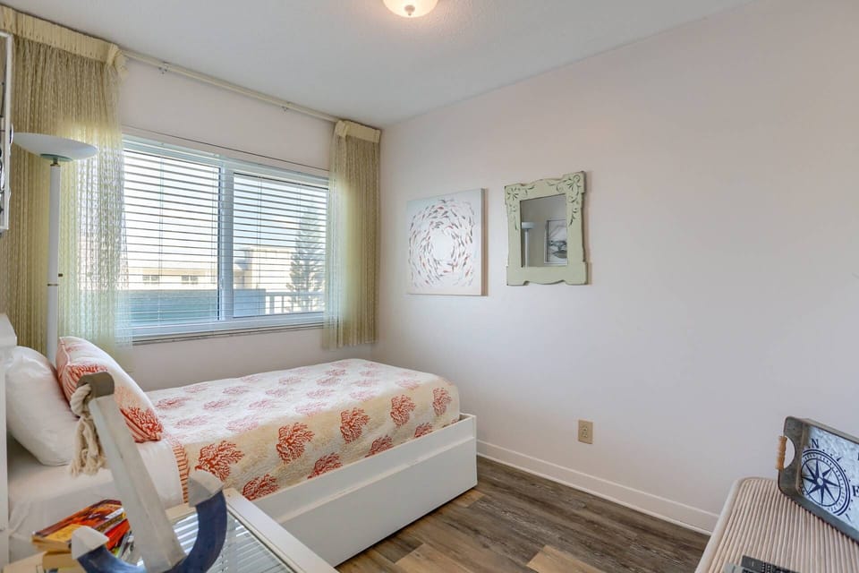 Guest Bedroom with Twin Size Trundle Bed and Flat Screen Smart TV