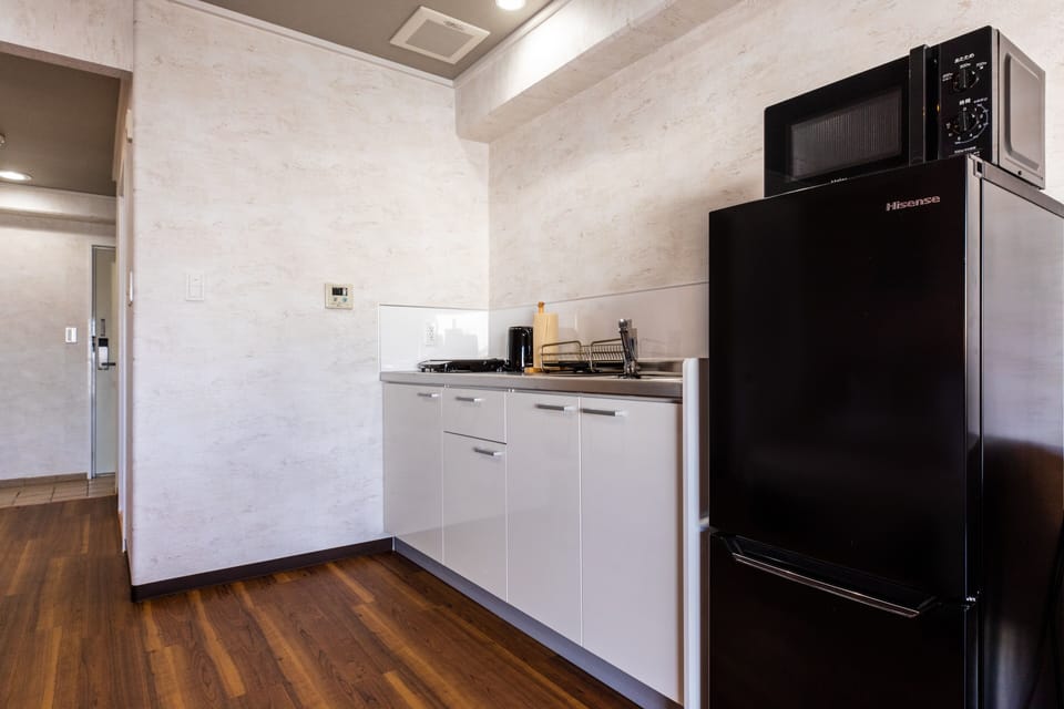 Apartment | Private kitchen | Full-size fridge, microwave, stovetop, griddle