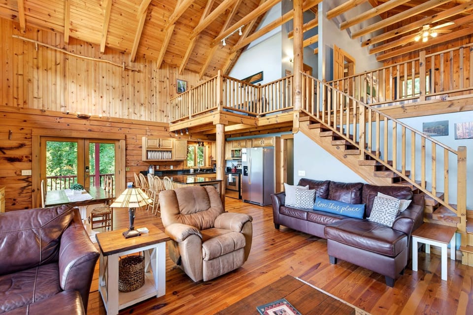 Kitchen, dining, and living areas.