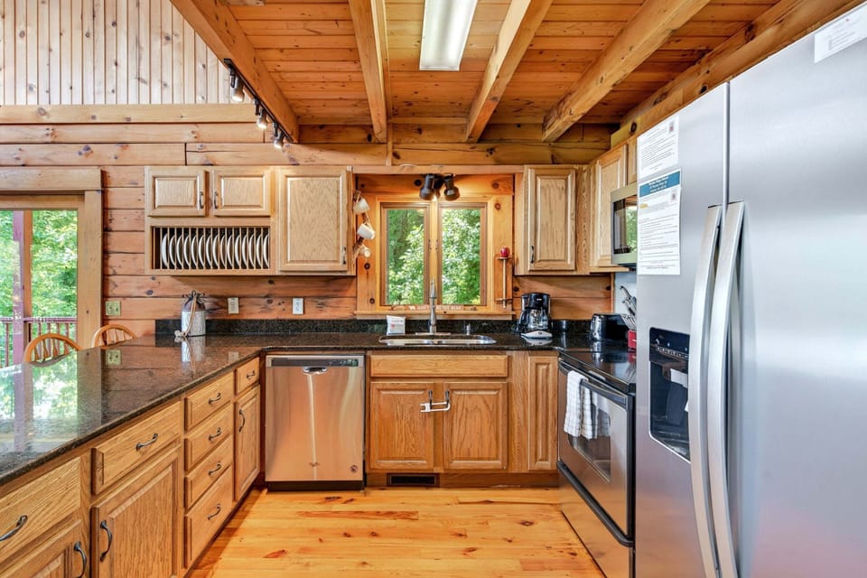 Sleek & well-stocked kitchen with dishwasher & Drip-style coffeemaker.