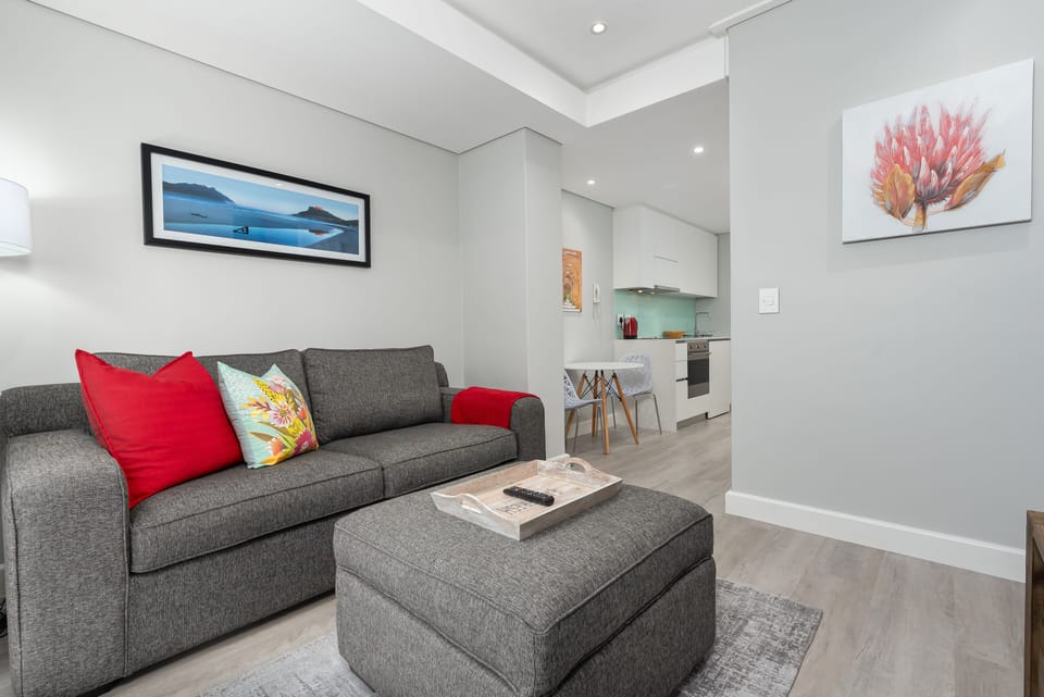 Signature Apartment | Living room | 32-inch flat-screen TV with cable channels, TV, Netflix