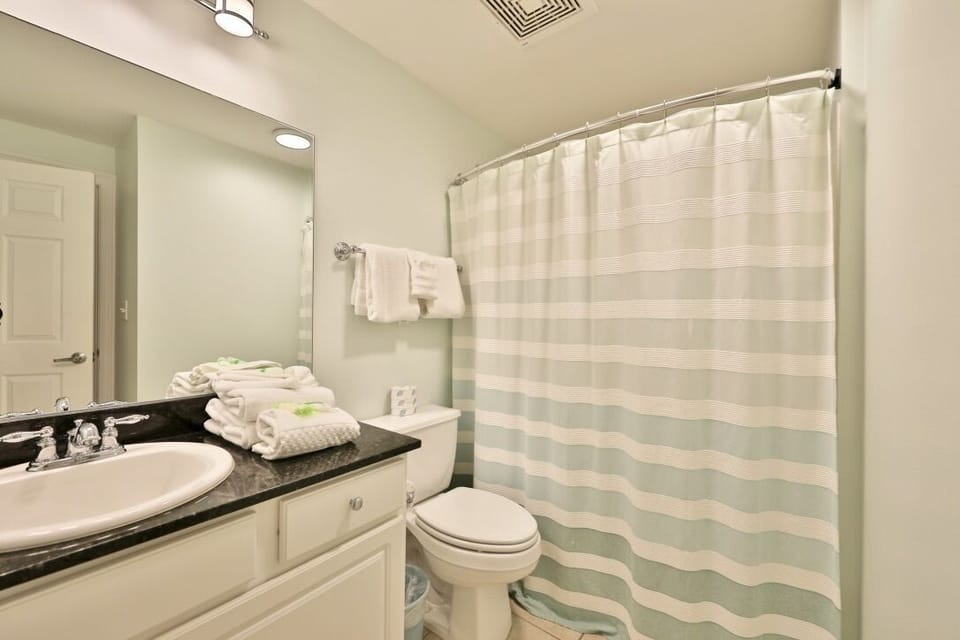 Master bathroom with shower/tub combo.