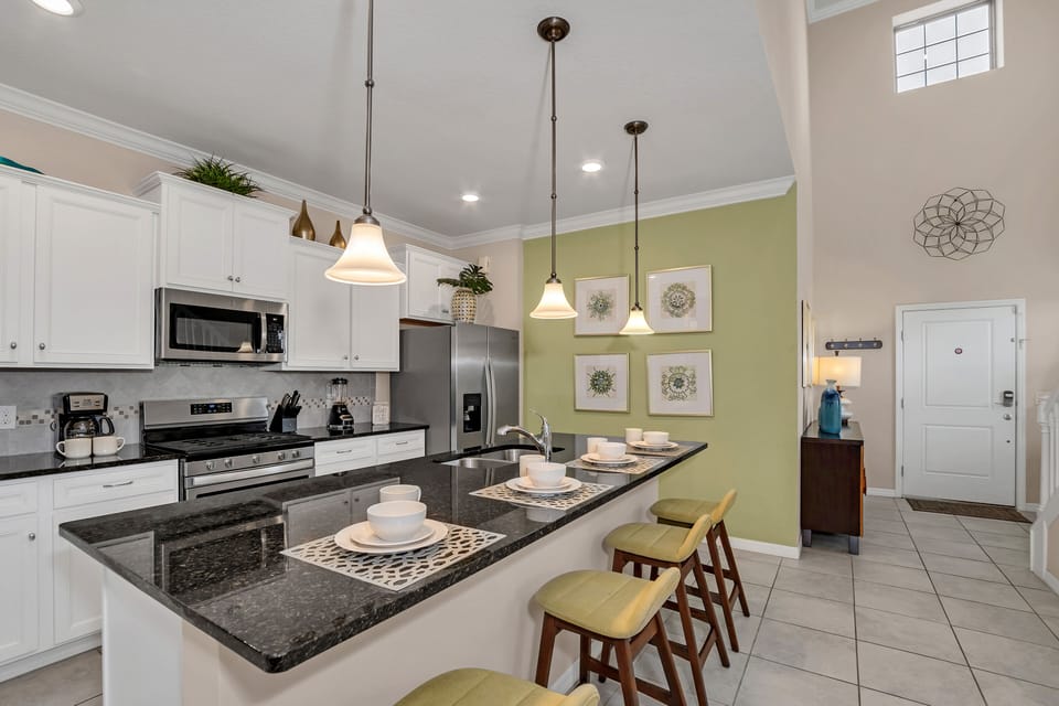 Culinary artistry meets modern elegance, as every corner boasts contemporary charm, transforming meal preparation into a stylish and sophisticated experience.