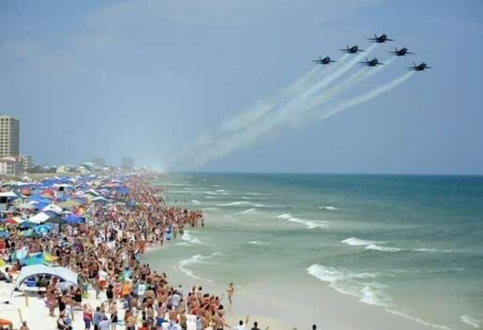 The Blue Angels make a flyover during their annual July show on the beach.

