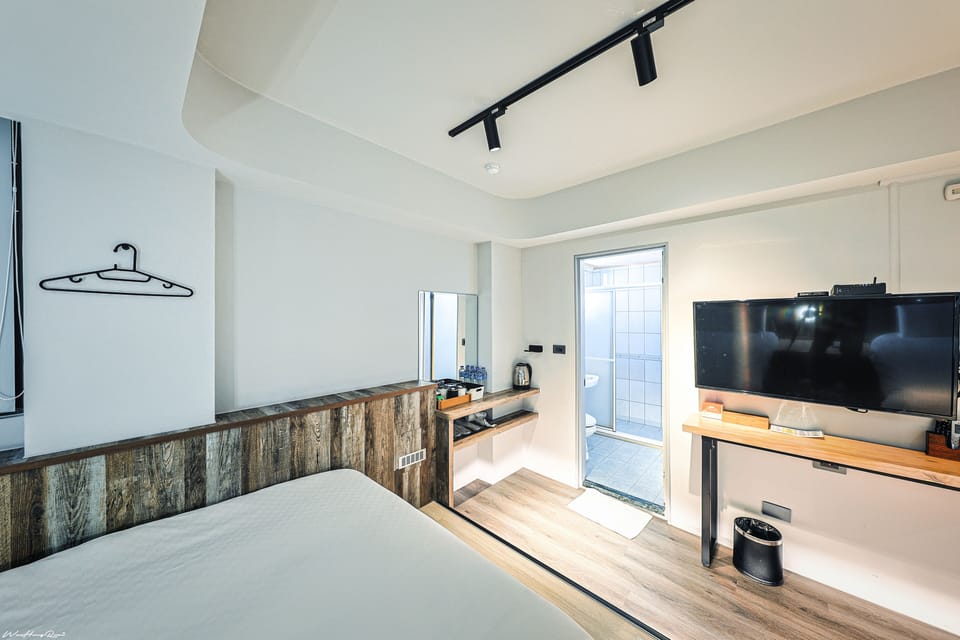 Deluxe Quadruple Room, 2 Double Beds | Down comforters, individually decorated, desk, laptop workspace