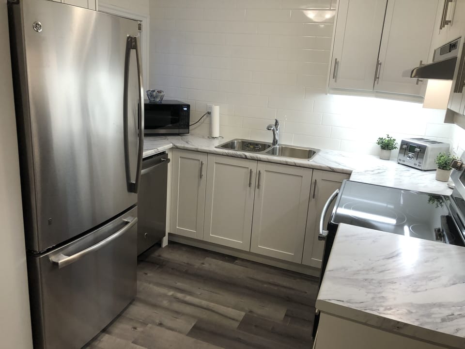 Our gorgeous modern kitchen comes complete with all the amenities of home