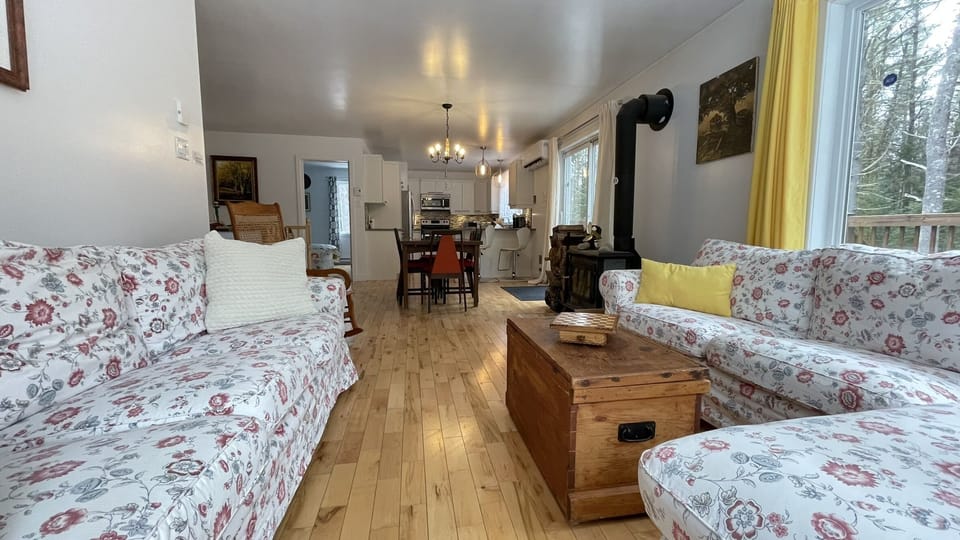 Open living room with view of the dining room