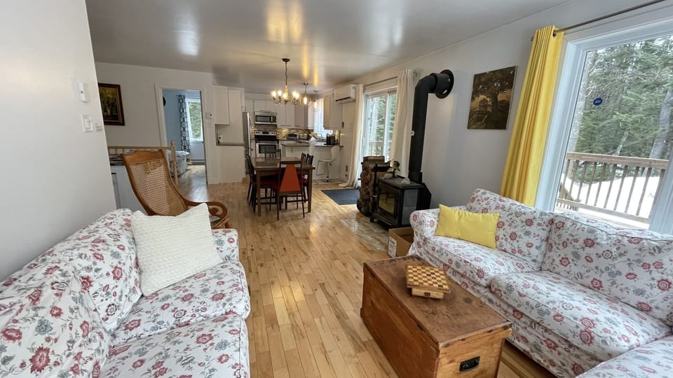 Open living room with view of the dining room