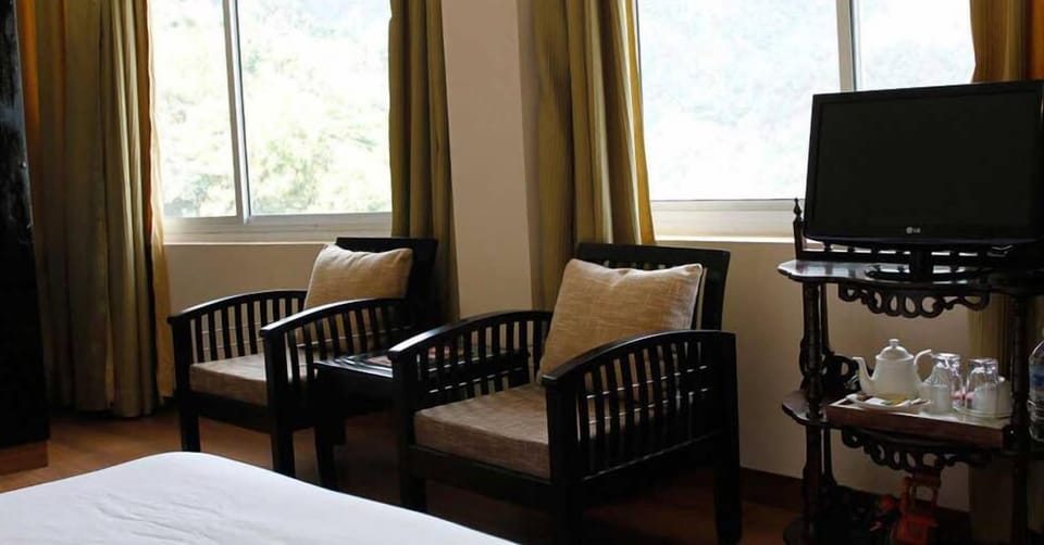 Blackout drapes, iron/ironing board