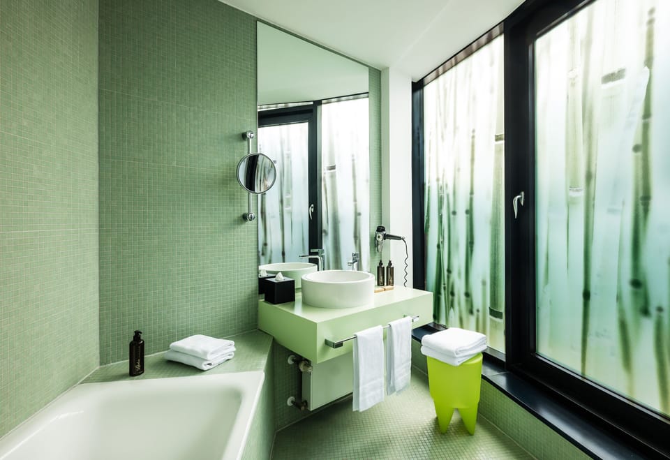 Superior Room | Bathroom | Rainfall showerhead, free toiletries, hair dryer, towels