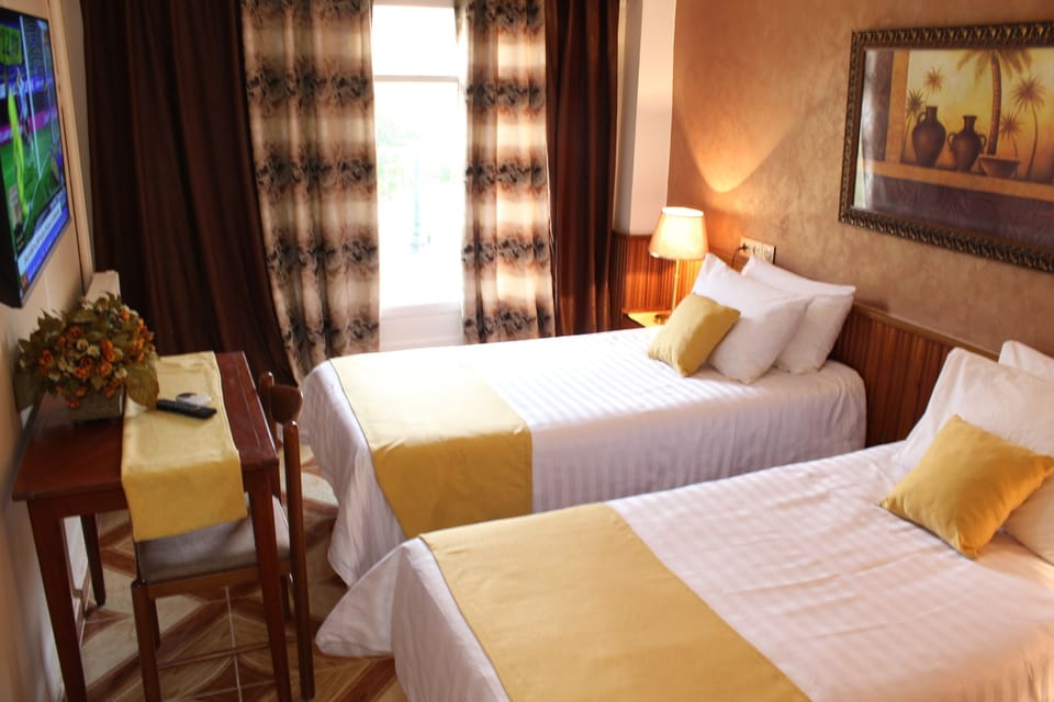 City Twin Room | Desk, laptop workspace, blackout drapes, rollaway beds (surcharge)