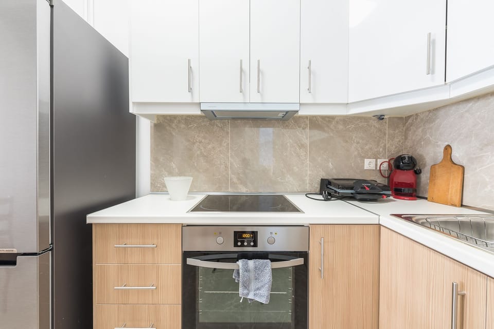 Apartment, 3 Bedrooms | Private kitchen | Full-size fridge, oven, stovetop, espresso maker