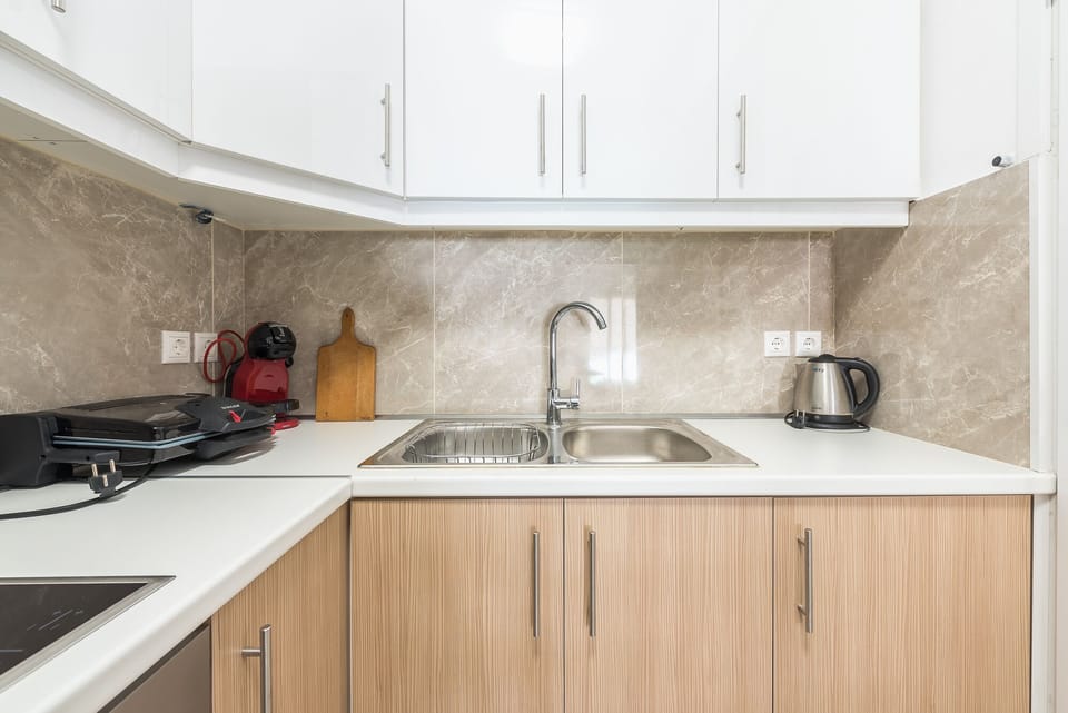 Apartment, 3 Bedrooms | Private kitchen | Full-size fridge, oven, stovetop, espresso maker