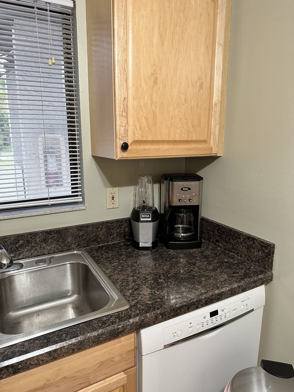 The Kitchen is complete with microwave, pour-thru coffee maker, toaster oven, and new dishwasher