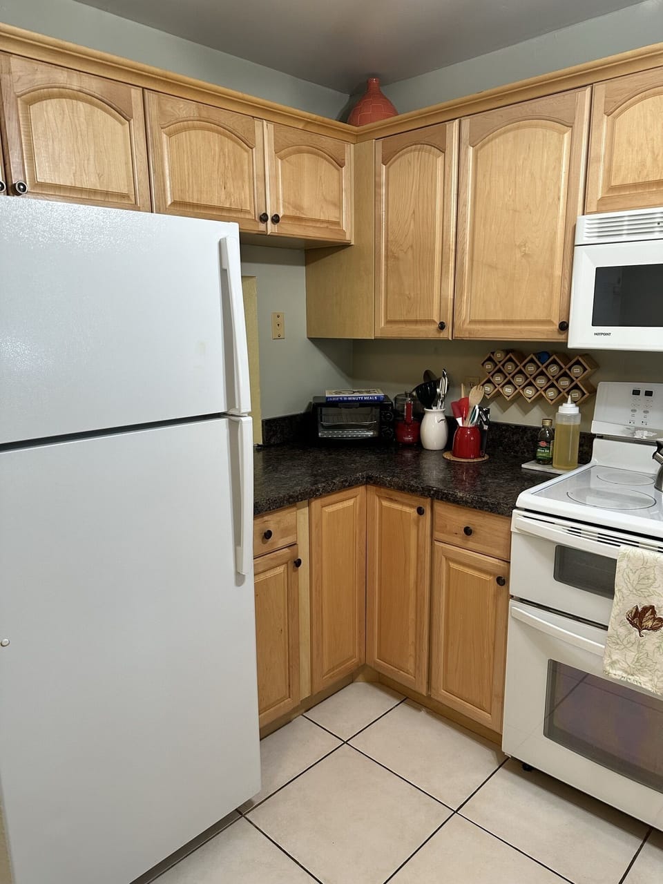 The Kitchen is complete with microwave, pour-thru coffee maker, toaster oven, and new dishwasher