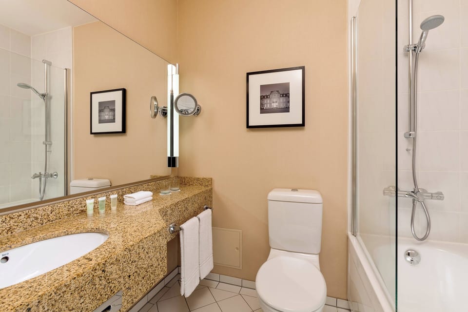 Combined shower/tub, free toiletries, hair dryer, bathrobes