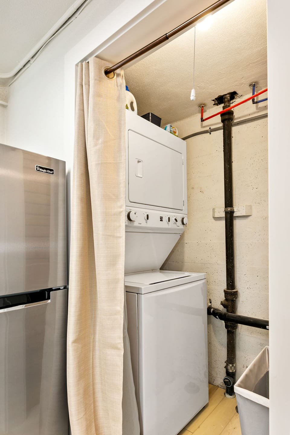 Free in-suite laundry in room off kitchen.