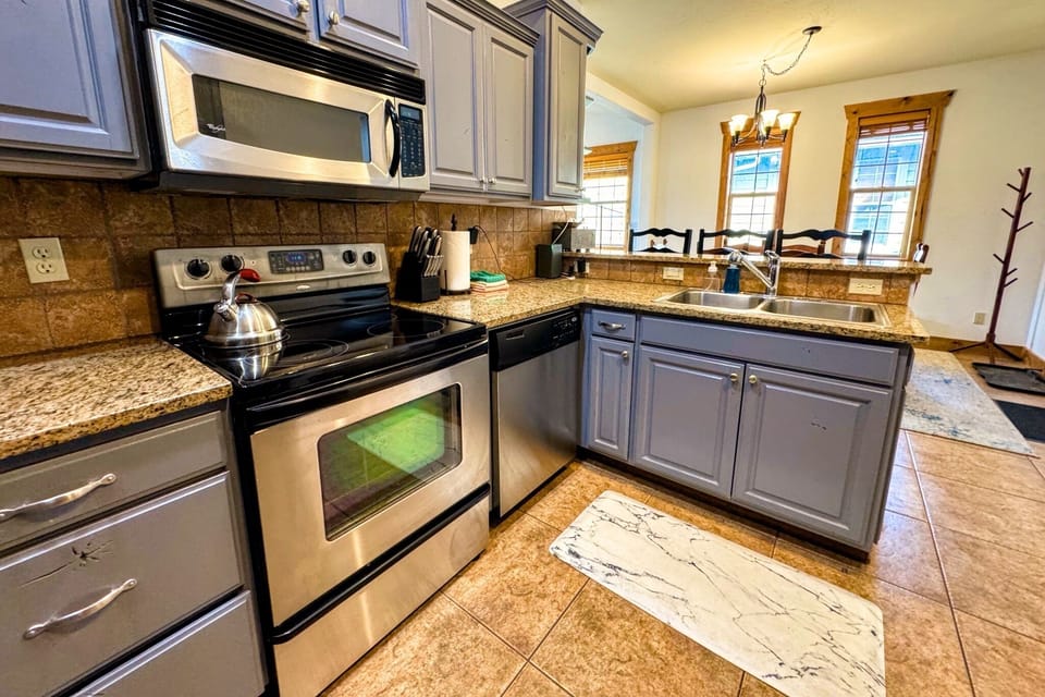 The kitchen comes stocked with everything you'd need to prepare a meal for any occasion. 