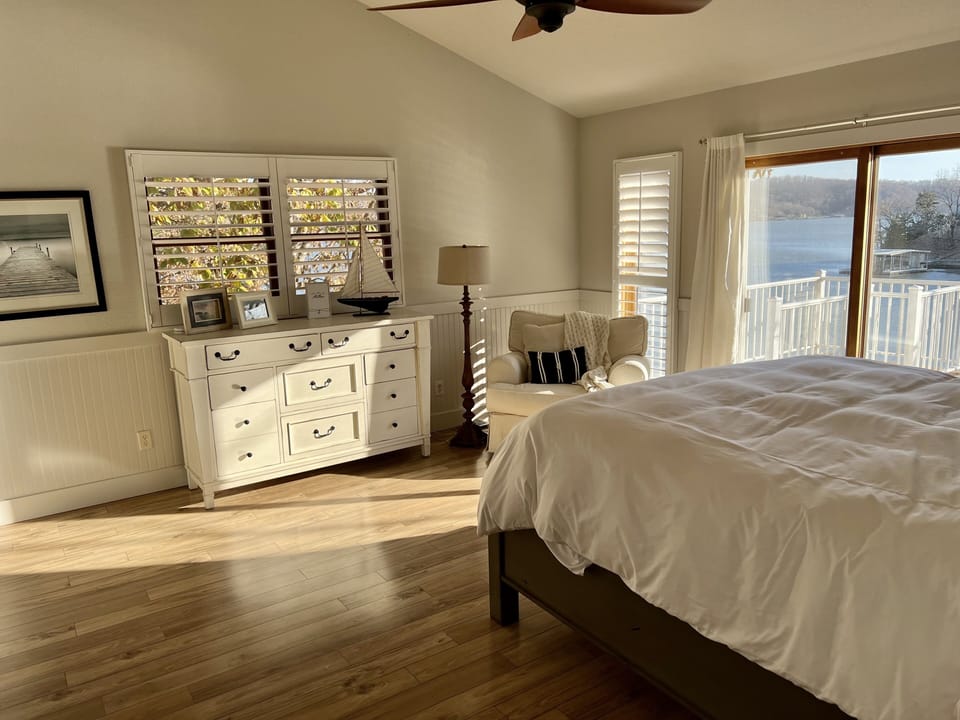 Master Bedroom with Lake View and Deck Access.  
