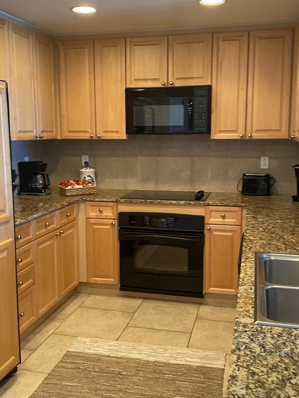 Beautiful roomy kitchen,granite countertops, stocked up with all you need !