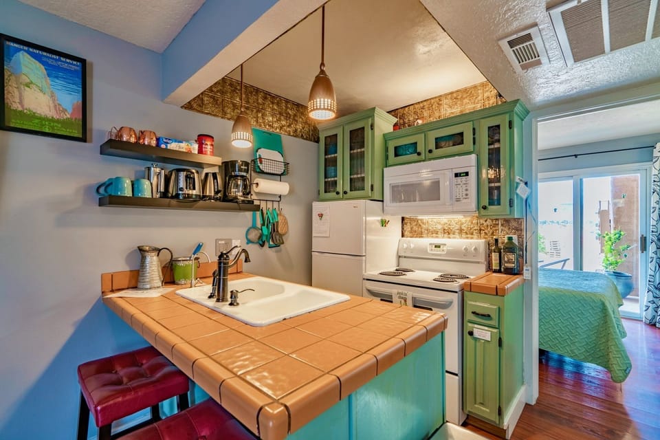 Cozy  kitchen is fully equipped  for cooking