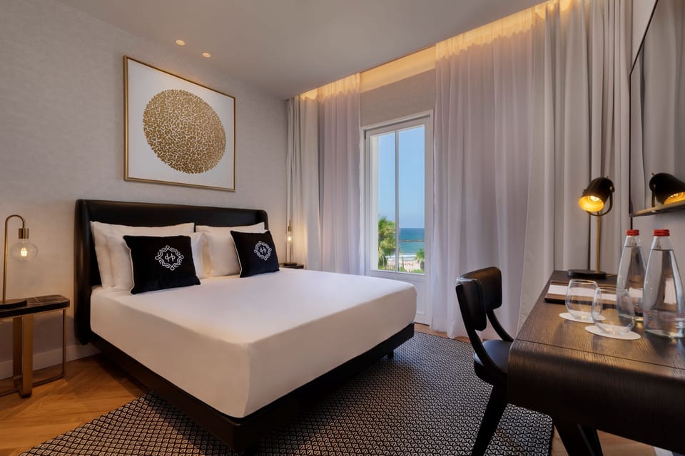 Deluxe Room, Sea View | In-room safe, desk, free WiFi, bed sheets