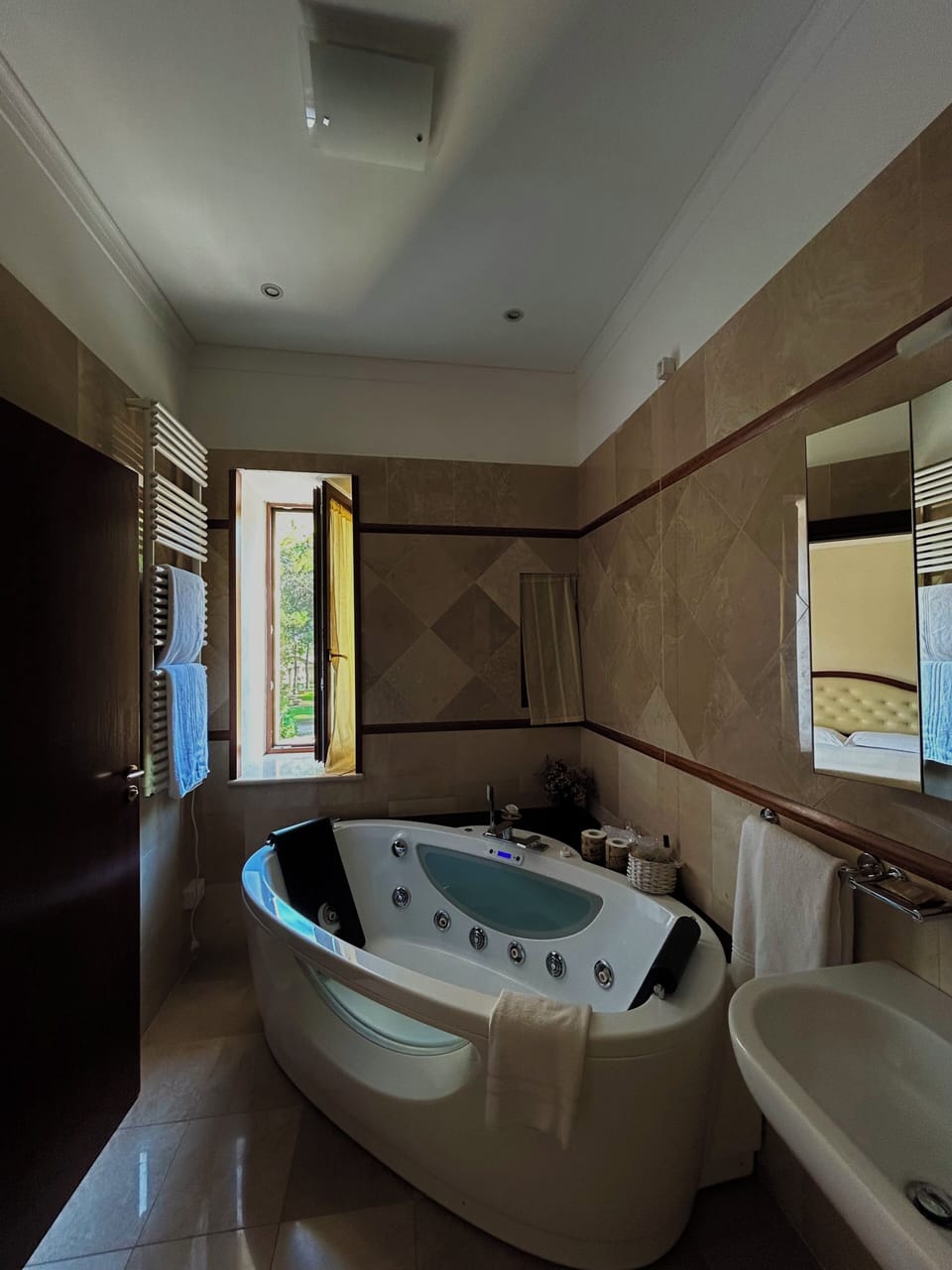 Suite, Hot Tub | Bathroom | Free toiletries, hair dryer, slippers, bidet