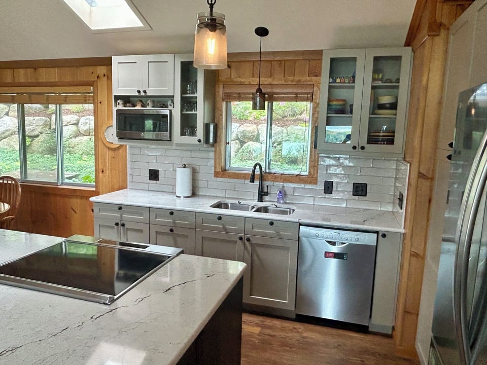 The newly renovated kitchen is modern, well-equipped and extremely user friendly